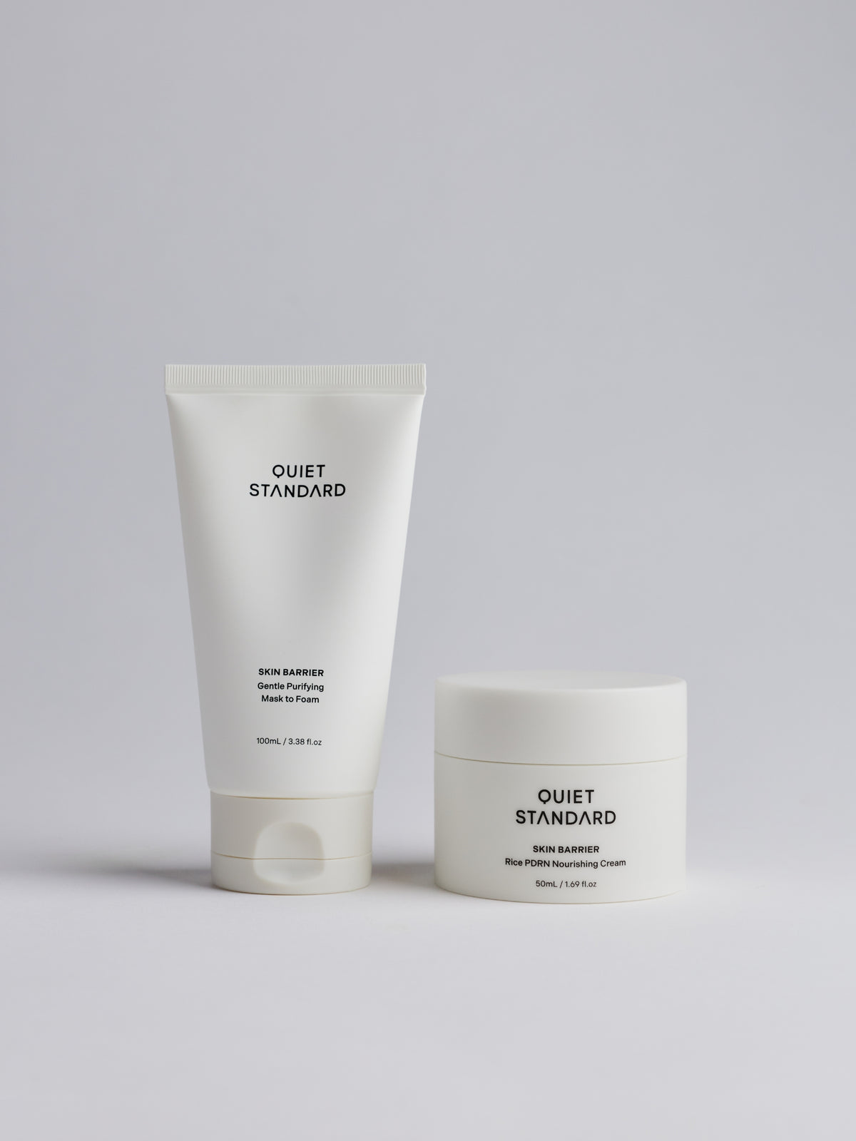 A skincare set from Quiet Standard, featuring Gentle Purifying Mask to Foam andRice PDRN Nourishing Cream, set against a solid light gray background.